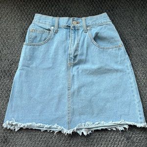 Jean skirt with raw edges